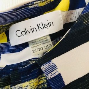 CK sleeveless plus size top in vibrant colors